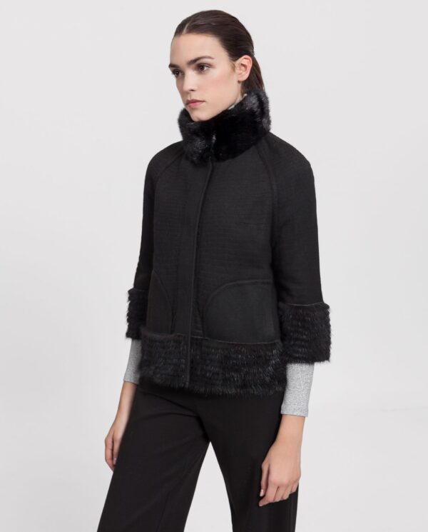 Chaqueta de visón negro reversible para mujer con lomos horizontales estilo liner marca Saint Germain